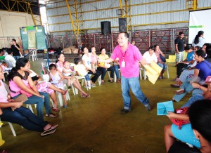 Maynard Marasigan, municipal link from Laguna discusses with the mother-beneficiaries of Pantawid Pamilya the importance of having a harmonious family relationship to keep your family strong and intact during a Family Development Session (FDS) in Nagcarlan, Laguna.
