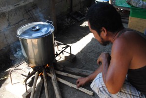 Joel makes two to three thousand pieces of hanging rice a day and sells them at the market for three pesos each.