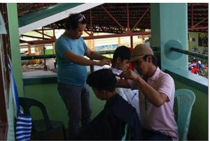 Free haircutting services to children-evacuees provided by volunteer hairdressers in the city.