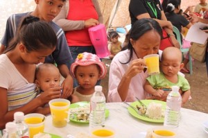 Pregnant women and lactating mothers are provided with hot soup and iron-fortified rice for lunch at the center.