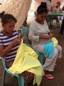Pregnant women are also taught how to sew small blankets and pillowcases for their babies inside the center