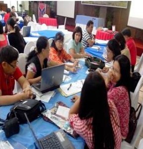 Participants discuss how they can effectively monitor the implementation of DSWD programs during the planning workshop.