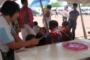 Ramona engages children in kiddie games during a play therapy session. Ramona engages children in kiddie games during a play therapy session.