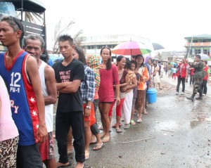 Sec. Dinky ensuring order in the distribution of relief goods at the Astrodome Evacuation Center in Sagkahan, Tacloban City