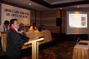 Assistant Secretary Gudmalin gives an overview of the learning exchange while Comval Governor Uy (center) and Governor Salceda listen.
