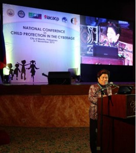 DSWD Secretary Corazon Juliano Soliman addresses participants during the opening of the National Conference on Child Protection in the Cyberage at the Manila Hotel.