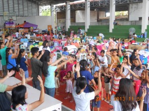 Children at an an evacuation center get ready for their play therapy session with social workers.