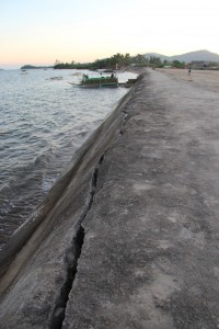 The crack on the sea wall is the only sign that Typhoon Yolanda caused the waters to rise in Barangay Mangorocoro, as it protected the villagers from the wrath of the typhoon