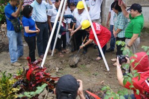 Sec. Soliman leads the ground breaking for the housing project.