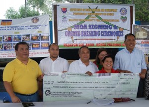 Turn-over of check to Habitat for Humanity.