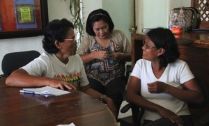 Remedios Igo-Igo (l) and Stephanie Macalandang (r) recall their experiences as members of the Madalag GAD Council.