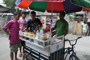 Loudemer serves his costumers to his best.
