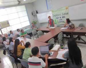 AVRC II Center Head Herminia Cabahug (standing) orients companies on the rights and privileges of PWDs as provided for in the Magna Carta for Persons with Disabilities during the Employers’ Forum.