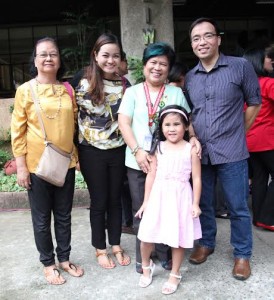 Sec. Soliman (2nd from right) poses with the Sugcang couple after Dennis shared their story as adoptive couple to DSWD employees during their flag ceremony.
