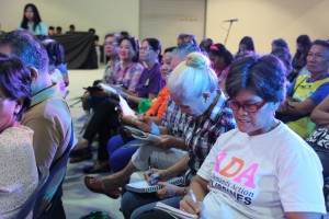 Seniors listen intently to discussions during the forum.