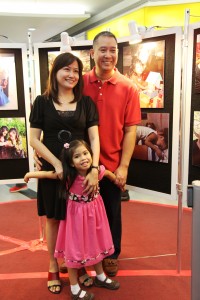 Happy family - Mr. and Mrs. Jojo and Janet Villa with their adopted daughter, Anna. The couple recounted their journey towards adoption during the launching of Adoption Consciousness Week and opening of the photo exhibit held last February 2014 at SM Manila. Since legally adopting Anna, the couple became active advocates of legal adoption.