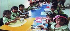 Children at the Luzviminda Yakap Day Care Center, enjoy their nutritious meal.