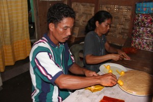 Couple Elias and Ritchel prepare their yema delicacy.