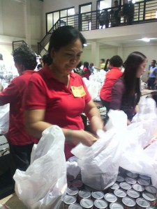 Alma repacking goods at NROC.