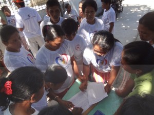 Pantawid Pamillyang Pilipino Program beneficiaries from Borongan City comprise the bulk of the DSWD restoration project in the area. They are seen here signing the attendance sheet before their actual work.