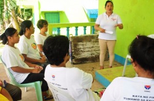 Estrella takes the lead of managing a livelihood group in her barangay.