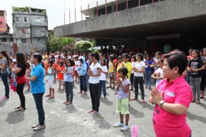 Sec. Soliman joins the streetchildren-beneficiaries of MCCT as they practice their song number for the Papal send-off on Monday.