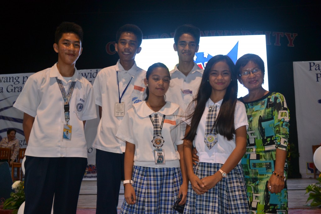 Rene Jr (left) together with high school friends. He is happy to have passed the UP College Admission Test.