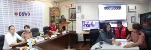 (First Photo) From left to right: Department of Social Welfare and Development (DSWD) Social Marketing Service (SMS) Director Cezario Joel C. Espejo, Assistant Secretary for Protective Services Hope V. Hervilla, Disaster Response Assistance and Management Bureau (DReAMB) OIC-Director Felino O. Castro V, listen to Undersecretary for Protective Services Vilma B. Cabrera address members of the press during the launching of the Virtual Operations Center (VOC) website of DSWD's Emergency Operations Center for Disaster Response. (Second Photo) From left to right: Department of Social Welfare and Development (DSWD) Undersecretary Vilma B. Cabrera, Disaster Response Assistance and Management Bureau (DReAMB) OIC-Director Felino O. Castro V, and DSWD Assistant Secretary Hope V. Hervilla examine situational reports on the recent tropical storm 'Carina' inside the new DReAMB Virtual Operations Center.