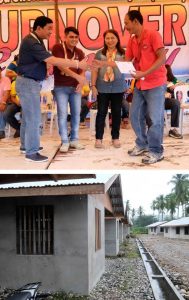 A beneficiary recieves his Certificate of Occupancy from LGU and DSWD officials.