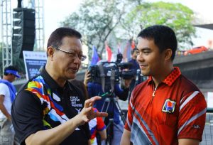 DSWD Asec. Jose Antonio Hernandez converses with the Malaysian Ambassador, H.E. Raszlan Abdul Rashid, before the start of the culminating program at the CCP Activity Area.