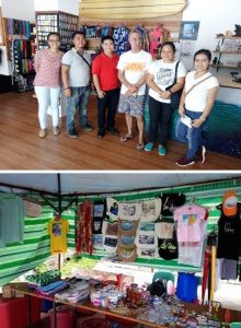 Photo 1: Department of Social Welfare and Development (DSWD) Field Office I staff together with the members of the Glassy Waves of San Juan, La Union Sustainable Livelihood Program Association (SLPA) and Mr. Bob Hunt (third from left), the group's business partner. Photo 2: The merchandise being sold by the association, which is now a leading souvenir and T-shirt printing services provider in the town.
