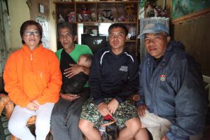 Jake Beltran (in black), a reformed drug surrenderer and graduate of the Ifugao Reflection Camp (IRC), thanks his family for their acceptance and support during his rehabilitation in the camp.
