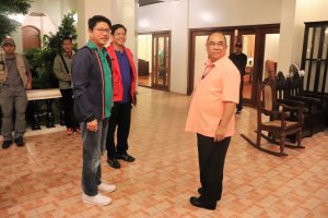 Secretary Bautista (in red and blue) and Director Reynoso (right) with Isabela Governor Bojie G. Dy at the Isabela Provincial Capitol Guest House.