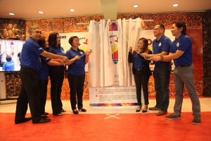 Department of Social Welfare and Development (DSWD) Assistant Secretary Glenda D. Relova (third from right) joins DSWD Social Technology Bureau (STB) division chiefs (from left to right) Melvin Dayrit, Annabel Oidem, Marilyn Moral, STB OIC-Director Helen Suzara, DSWD Social Marketing Service (SMS) Director Cezario Joel Espejo, and SMS division chief Edward Gonzales in unveiling the new brand logo of the STB at the ST Expo 2018.