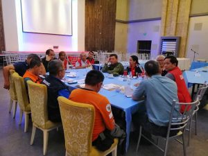 Department of Social Welfare and Development (DSWD) Secretary Rolando Bautista (far right) listens to the reports of agency representatives of the National Disaster Risk Reduction and Management Council (NDRRMC), DSWD Field Offices (FOs) II and Cordillera Administrative Region (CAR) and concerned provincial and local govenment units (LGUs) during their strategic meeting in Cauayan, Isabela.