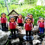 The miniature paper quilling dolls of Department of Social Welfare and Development (DSWD) personnel in the iconic DSWD red vest created by Cebu-based artist Libeth Paracuelles.