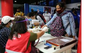 Locally stranded individuals (LSIs) staying in Pier 4, North Port, Manila receive financial assistance from the Department of Social Welfare and Development (DSWD) Field Office National Capital Region (NCR).