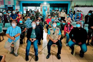 Department of Social Welfare and Development (DSWD) Assistant Secretary Joseline Niwane (2nd row, right) joins the Inter-Agency Task Group Western Mindanao – Management of Returning Filipinos (IATG-MREF) as they welcome Filipino transferees who safely arrived in Bonggao, Tawi-Tawi from Sabah.