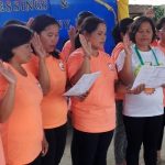 Women take their oath as volunteers of Kapit-Bisig Laban sa Kahirapan-Comprehensive and Integrated Delivery of Social Services (Kalahi-CIDSS).