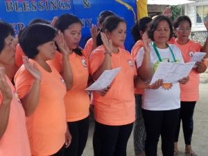 Women take their oath as volunteers of Kapit-Bisig Laban sa Kahirapan-Comprehensive and Integrated Delivery of Social Services (Kalahi-CIDSS).
