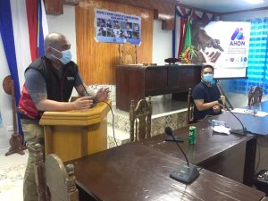 Department of Social Welfare and Development (DSWD) Assistant Secretary for Visayas Affairs Victor Neri delivers his message of support for the Aid and Humanitarian Operations Nationwide (AHON) Convergence Program during its launch in San Benito, Surigao del Norte. Also in photo is Presidential Communications Operations Office (PCOO) Secretary Martin Andanar.