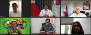 Department of Social Welfare and Development Secretary Rolando Joselito D. Bautista (above center), Department of Trade and Industry Secretary Ramon Lopez, Department of Information and Communications Technology Secretary Gregorio Honasan, Department of Health Undersecretary Charade Grande, Assistant Secretary Atty. Jingle Chua of the Office of the President, and Philippine Charity Sweepstakes Office Assistant General Manager Juliet Aseo at the virtual signing of the Joint Memorandum Circular No. 1, series of 2021 or the “Implementing Guidelines for Accelerating and Harmonizing Aid and Humanitarian Operations of the National Government or AHON During Disasters and Emergencies.”