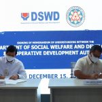 Department of Social Welfare and Development (DSWD) Secretary Rolando Bautista (left) and Cooperative Development Authority (CDA) Chairman Undersecretary Joseph Encabo formalize the partnership between the two agencies to assist cooperatives around the country.