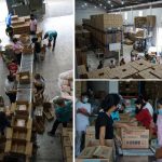 Staff of DSWD-Field Office 7 and volunteers repack relief supplies at the warehouse of the Field Office in Cebu City.