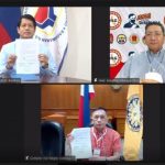 Social Welfare and Development Secretary Rolando Joselito D. Bautista, Interior and Local Government Undersecretary Jonathan Malaya, and Commission on Elections Chairperson Saidamen B. Pangarungan show the newly signed Memorandum of Agreement which will serve to strengthen efforts to insulate DSWD's programs and services from political interference.