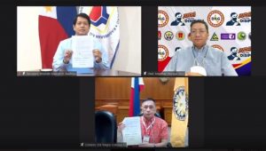 Social Welfare and Development Secretary Rolando Joselito D. Bautista, Interior and Local Government Undersecretary Jonathan Malaya, and Commission on Elections Chairperson Saidamen B. Pangarungan show the newly signed Memorandum of Agreement which will serve to strengthen efforts to insulate DSWD's programs and services from political interference.