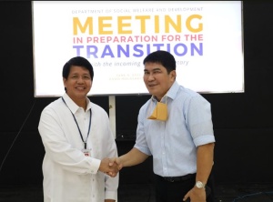 Outgoing Department of Social Welfare and Development (DSWD) Secretary Rolando Joselito D. Bautista congratulates incoming Secretary Erwin T. Tulfo during the transition briefing for the incoming DSWD management.