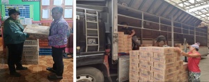 One of the internally-displaced persons receives a Family Food Pack provided by the DSWD; staff of the DSWD Field Office CAR prepare the goods to be delivered to Banaue.