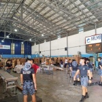 Volunteers from the Bureau of Jail Management and Penology (BJMP) assist in the repacking operations at the National Resource Operations Center (NROC)
