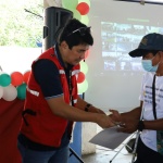 Department of Social Welfare and Development (DSWD) Secretary Erwin T. Tulfo hands over the cash aid earned by a beneficiary of the Kapit-Bisig Laban sa Kahirapan-Comprehensive and Integrated Delivery of Social Services’ (KALAHI-CIDSS) Cash-for-Work (CFW) program for Persons with Disabilities on Saturday, December 3.
